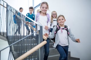 happy-pupils-on-staircase-leaving-school-2024-09-15-16-44-04-utc